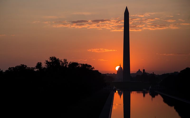 Washington Monument and reflection at sunset